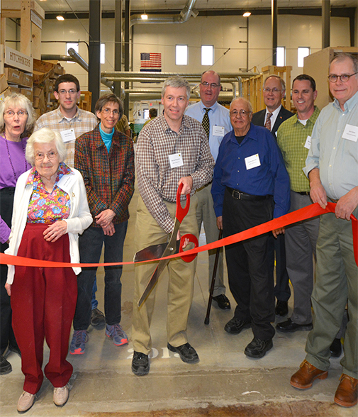 From left to right: Luthera Rainville; Harriett Brown; Adam Rainville; Jill Rainville; owner, Mike Rainville; VP of the National Bank of Middlebury, Grover Usilton; Claude Rainville; Governor, Jim Douglas; President BLC, Mike McLaughlin and Vice President of Business Development BLC, Jim Pulver.